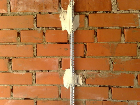 Механизированная штукатурка стен по маякам